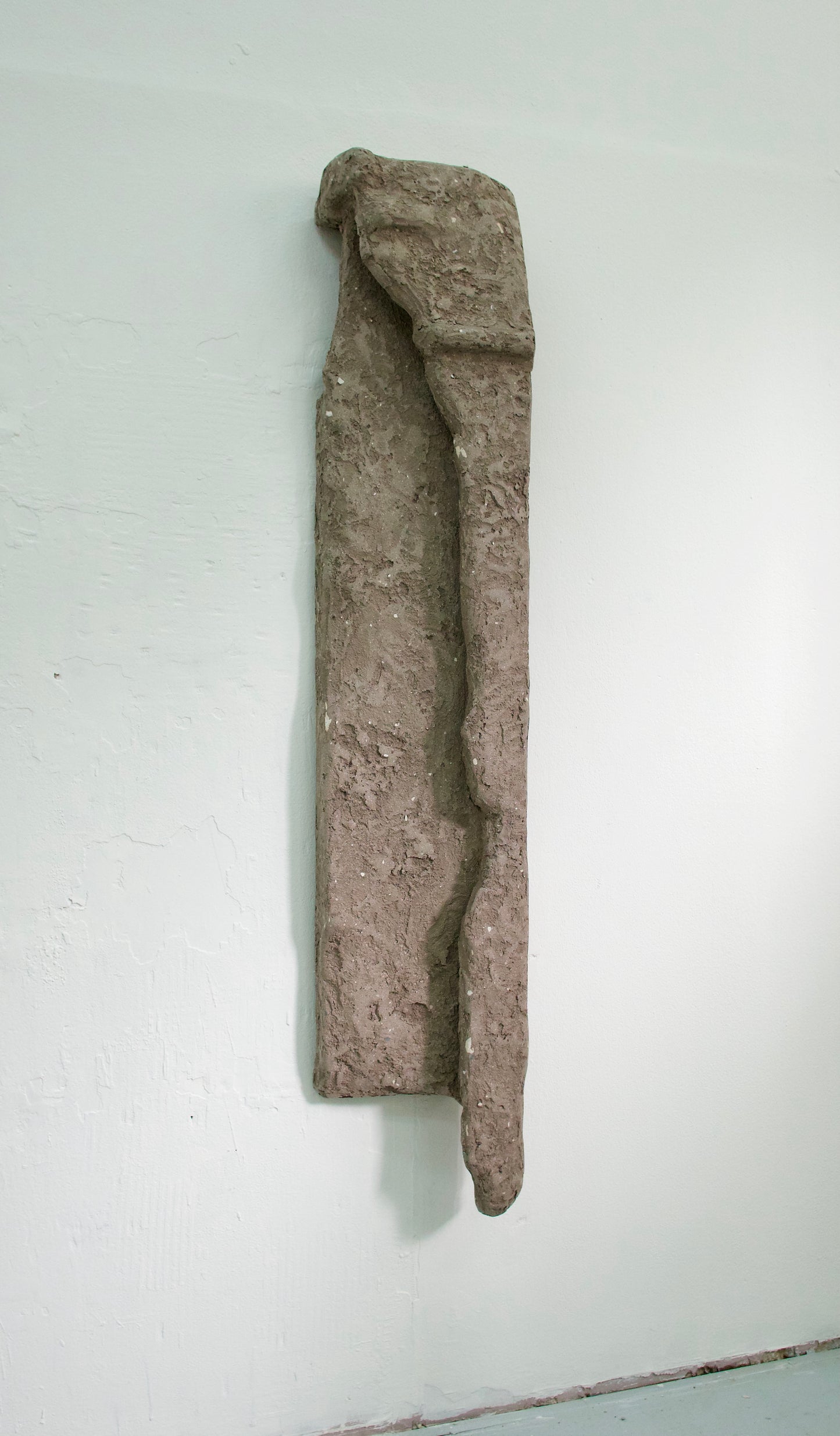 Untitled (The Packaging), 2023 <br><small> Plaster, rubble and pigment on found styrofoam base, 
170 x 30 cm, €1925</small>