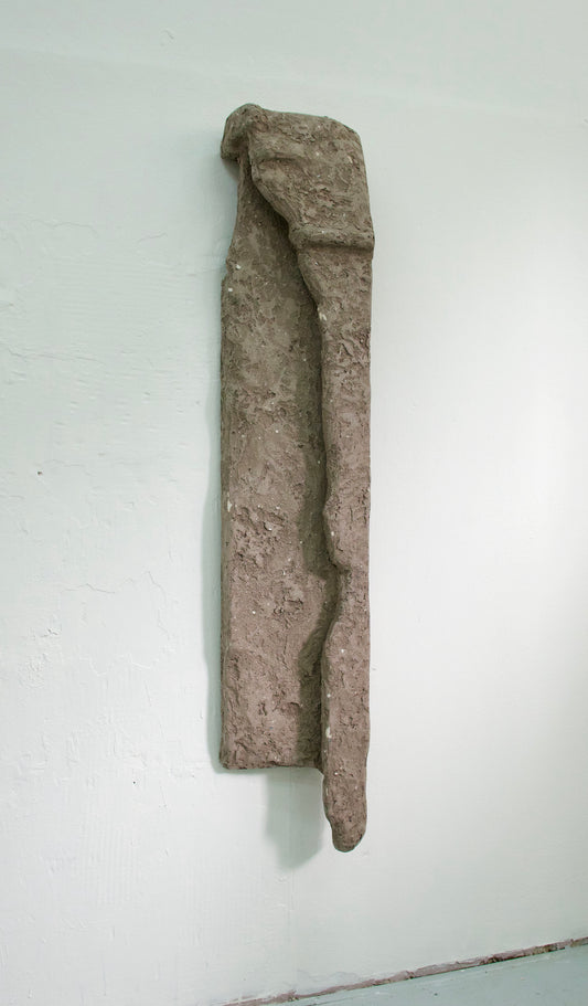 Untitled (The Packaging), 2023 <br><small> Plaster, rubble and pigment on found styrofoam base, 
170 x 30 cm, €1925</small>