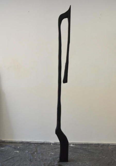 The ashes in the electric fireplace are still warm no. 3, 2025 <br><small>wood and tar, 235 x 19 x 9 cm, €1500</small>