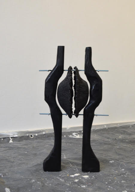 The ashes in the electric fireplace are still warm no. 5, 2025 <br><small>wood, metal, charcoal and tar, 48 x 28 x 26 cm, €950</small>