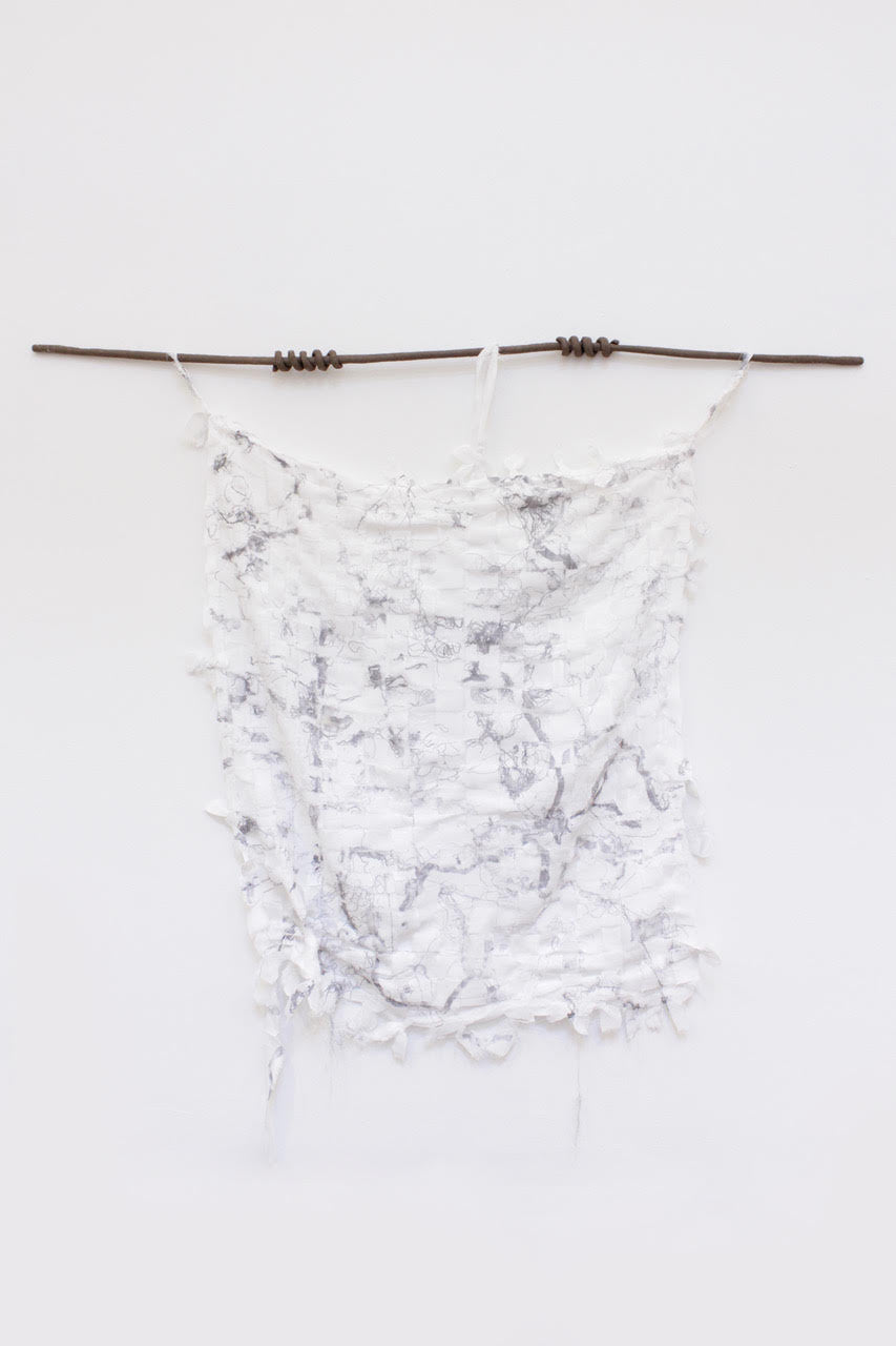 Interlacing Traces: Entangled Forms, 2025 <br><small> re-used textiles, imprint extracted from discarded garments, ceramic elements, 100 x 70 cm, €1800 </small>