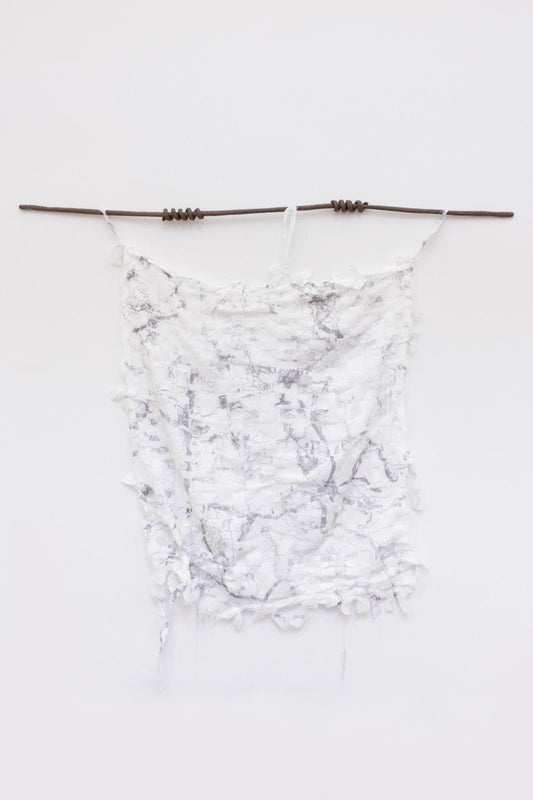 Interlacing Traces: Entangled Forms, 2025 <br><small> re-used textiles, imprint extracted from discarded garments, ceramic elements, 100 x 70 cm, €1800 </small>
